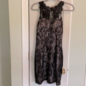 Sexy black lace with nude lining cocktail dress